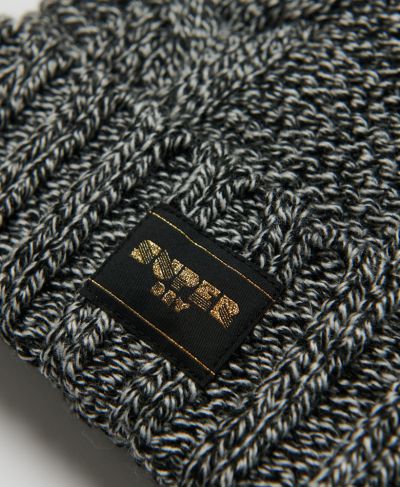 სუპერდრაი ქუდი Cable knit beanie hat 